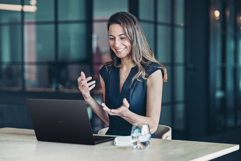 Smiling businesswoman in a video conference